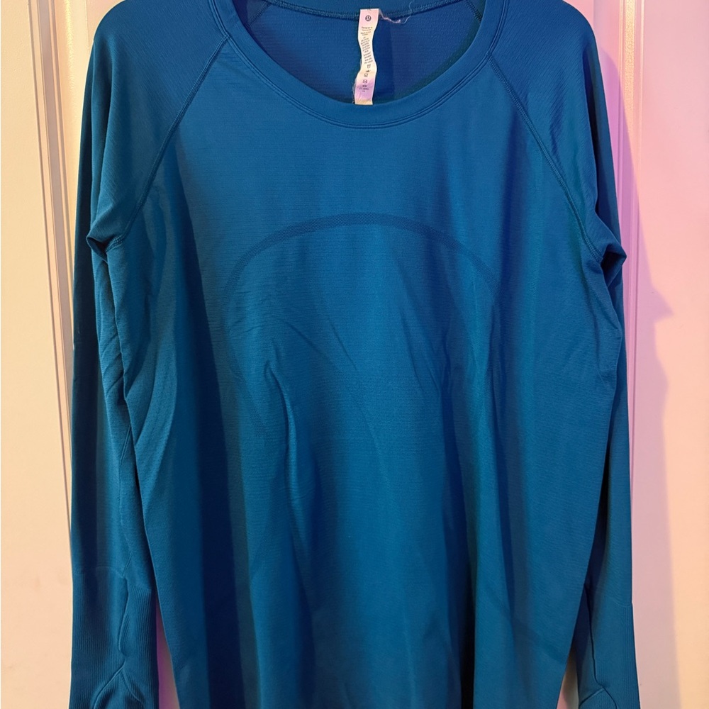 Lululemon swiftly long sleeve hip length dark teal color size 16